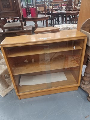 Lot 118 - A mid century modern oak book case with...