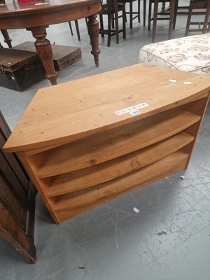 Lot 123 - A vintage oak bow front three shelf media...