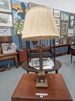 Lot 132 - A brass Corinthian column form table lamp with...