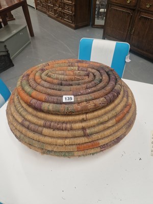 Lot 135 - A large vintage coiled raffia lidded basket H...