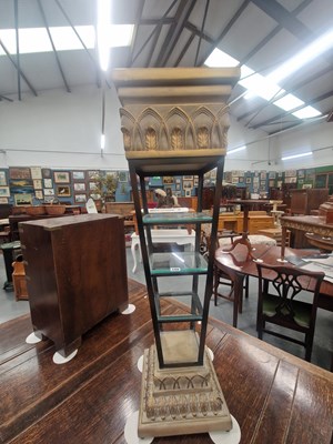 Lot 144 - A decorative four shelf plinth composed of a...