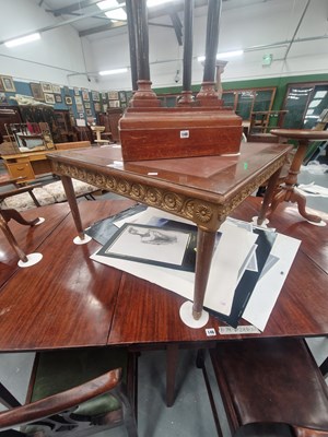 Lot 147 - A  vintage mahogany coffee table with leather...
