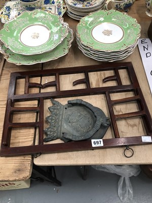 Lot 697 - A vintage doorknocker featuring a knight and...
