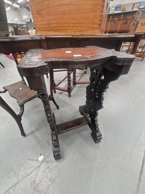 Lot 162 - An antique Chinese carved hardwood occasional...