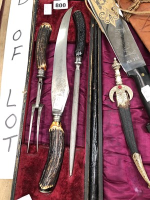 Lot 800 - A carving set, a Solingen steel blade and a...
