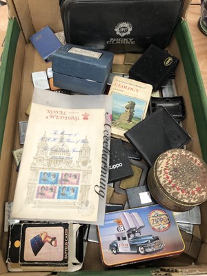 Lot 813 - A collection of Zippo lighters and collectables
