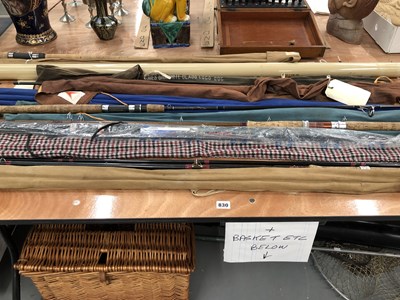 Lot 830 - Fishing equipment: rods, net, large basket,...