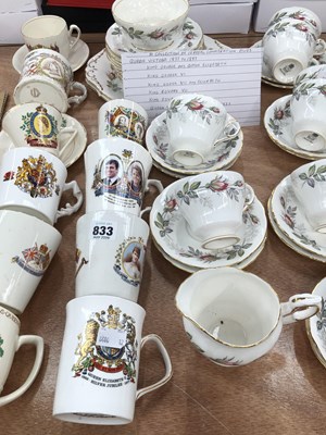 Lot 833 - A collection of ten royal commemorative mugs,...
