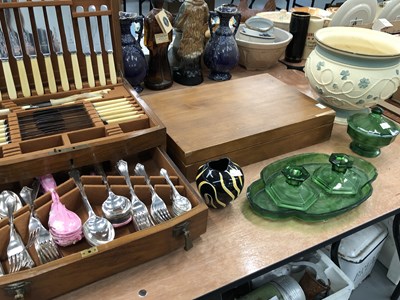 Lot 849 - A green glass dressing table set, a West...