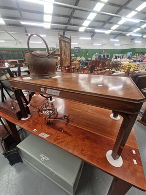 Lot 187 - A vintage mahogany coffee table on square...