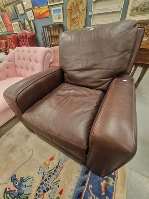 Lot 192 - A modern leather reclining armchair retailed...