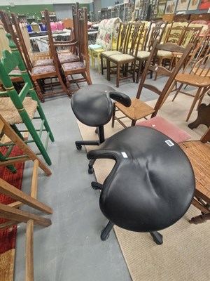 Lot 200 - Six saddle seat office chairs, including three...