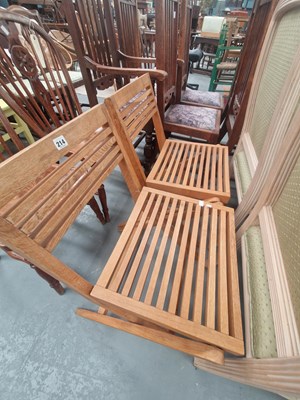 Lot 214 - A pair of modern oak folding slatted chairs