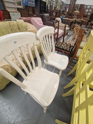 Lot 217 - A pair of painted slat back kitchen chairs on...