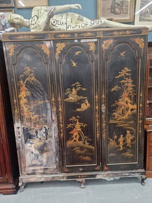 Lot 231 - An Edwardian Chinoisserie armoire of three...