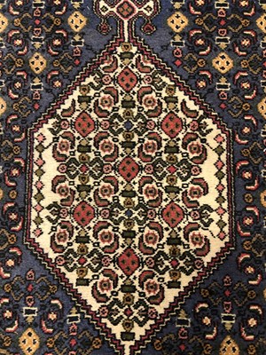 Lot 1392 - A Persian tribal runner 376 × 69cm