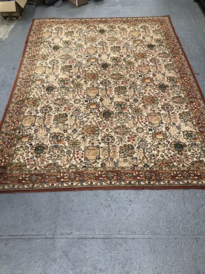 Lot 1393 - A machine made carpet of Persian design