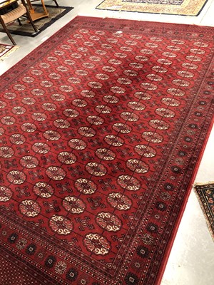 Lot 1406 - A machine made carpet of Bokhara design 348 ×...