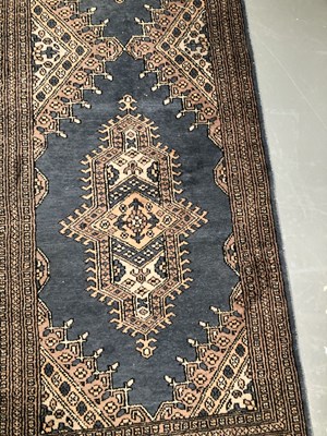 Lot 1409 - A pair of oriental runners of Persian design...