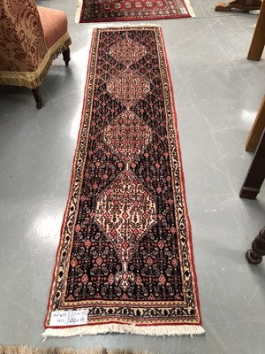 Lot 1411 - An Oriental runner of Persian design 232 × 56cm