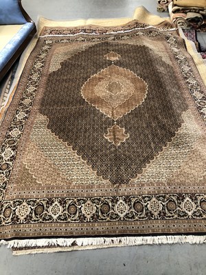 Lot 1414 - An oriental carpet of Persian Tabriz design...