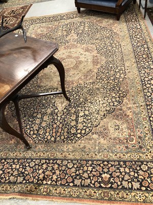 Lot 1420 - A machine made carpet of Persian design 355 ×...