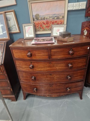 Lot 242 - A Victorian mahogany bow front chest of two...