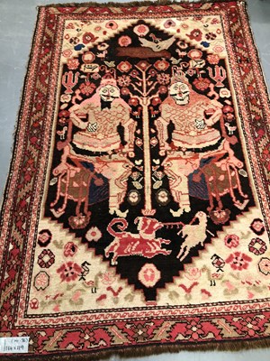 Lot 1433 - An unusual antique Persian Caucasian tribal...