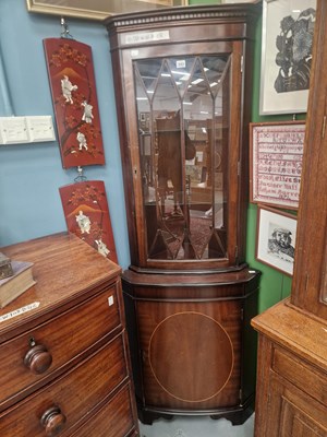Lot 243 - A 20th century inlaid mahogany glazed top...