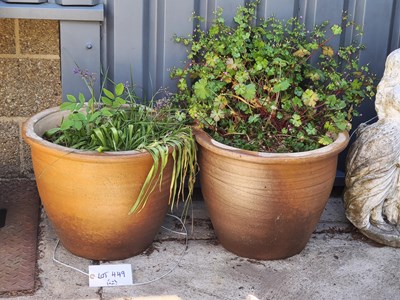 Lot 449 - A pair of glazed terracotta garden pots