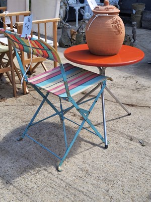 Lot 460 - A folding camping table and chair