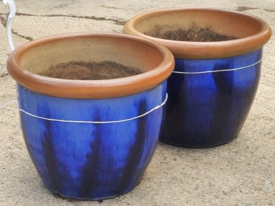 Lot 463 - A pair of large blue glazed terracotta garden...