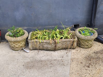 Lot 473 - A concrete planter along with a pair of...
