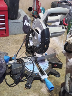 Lot 494 - A Macallister 240v compound mitre saw with a...