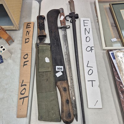 Lot 906 - A machete and three bayonets