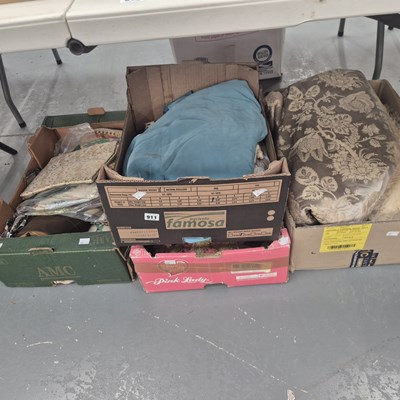 Lot 911 - Four boxes of upholstery and other fabrics,...
