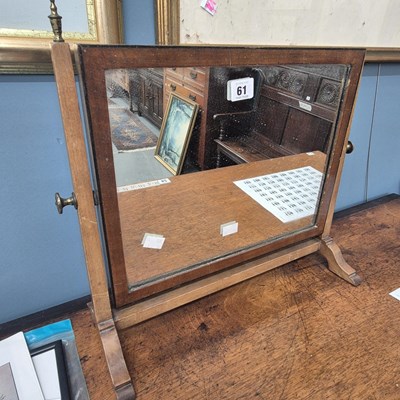 Lot 61 - A small swing mirror