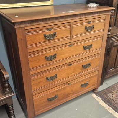 Lot 69 - An Edwardian walnut chest of five drawers H...