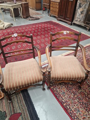 Lot 249 - A pair of antique mahogany low ladder back arm...