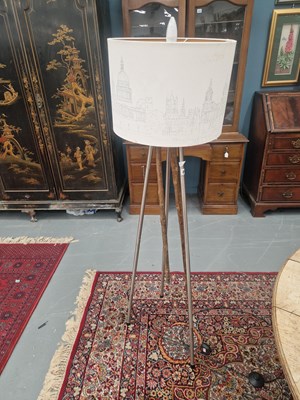 Lot 250 - A modern tubular metal tripod standard lamp...
