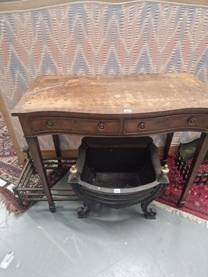 Lot 264 - An antique mahogany serpentine two drawer side...