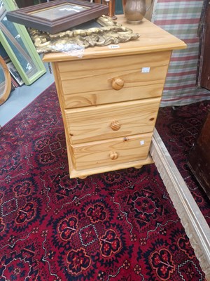 Lot 266 - A pair of modern pine three drawer bedside...