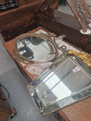 Lot 314 - An oval  Regency style wall mirror and a...