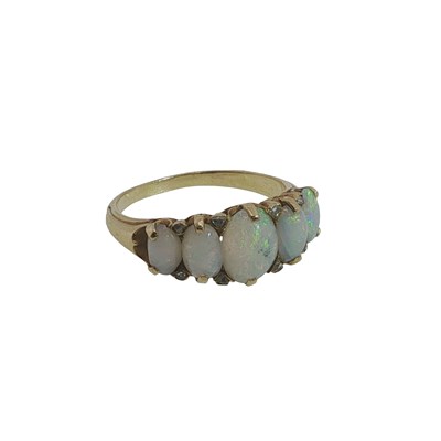 Lot 1071 - A late Victorian graduated five-stone opal...