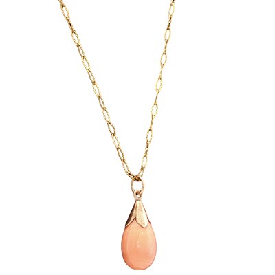 Lot 1077 - An early 20th-century coral drop pendant: the...
