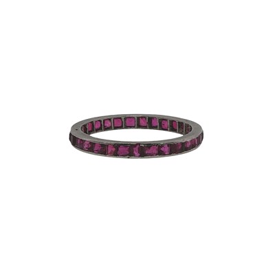 Lot 1103 - An Art Deco style platinum full eternity ring...