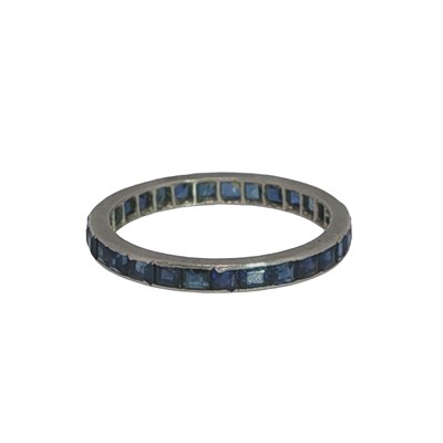 Lot 1104 - An Art Deco style platinum full eternity ring...