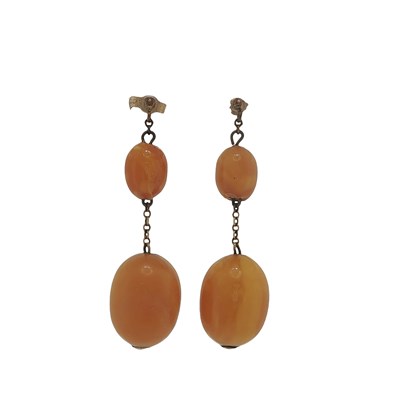 Lot 1110 - A pair of vintage amber coloured graduated...