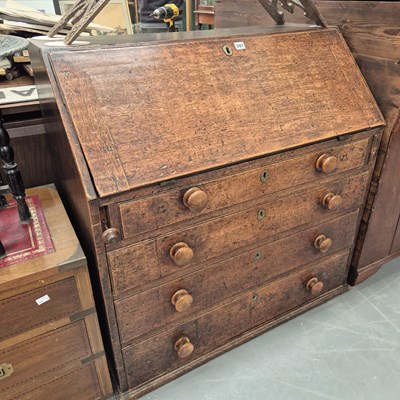 Lot 297 - A Georgian oak bureau with bun handles H 97 W...