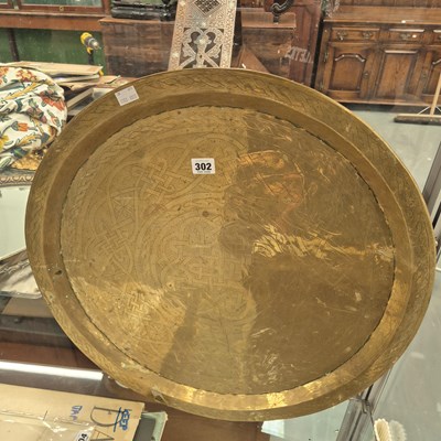 Lot 302 - An eastern brass Benares tray Ø 59cm